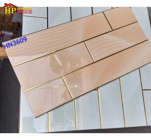 GẠCH TRANG TRÍ 30X60 SẮC MÀU CAM NUDE NHẠT HỌA TIẾT GIẢ THANH THẺ SOLE CHỈ VÀNG NHẬP KHẨU CAO CẤP